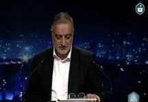 زاکانی با یک کتاب جدید به مناظره چهارم آمد + عکس