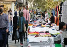 شرم آور / قهرمان کشتی جهان در خوزستان دست‌فروشی می‌کند! + عکس