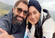 عکس عاشقانه هادی کاظمی و همسرش سمانه پاکدل زیر باران نوروزی!